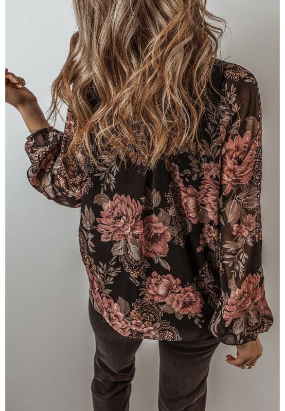Black floral print
  V neck wrap design
  Balloon sleeves
  Loose fit for comfort
  Fresh and feminine look
  Trendy and chic silhouette
Material: 100% Polyester