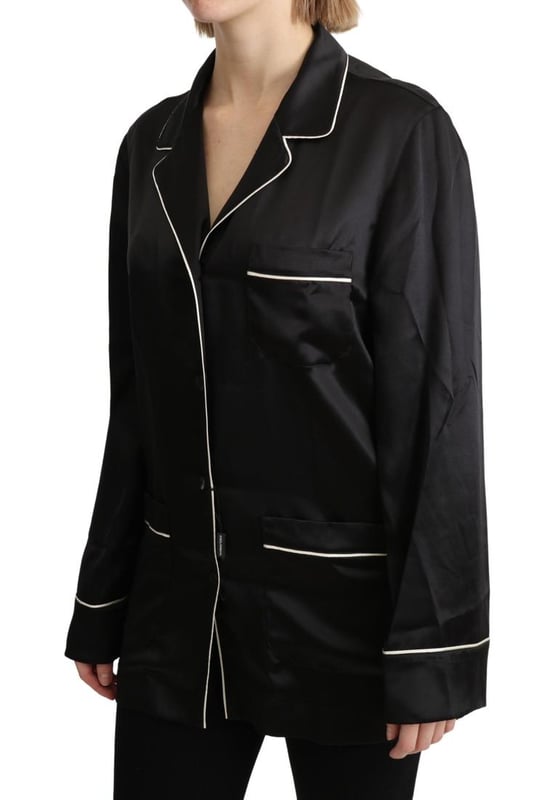 Stunning Dolce & Gabbana silk blouse shirt with logo details
  Color: Black with white detailing
  Full button closure
  Three front pockets
  Made in Italy
  Material: 100% Silk