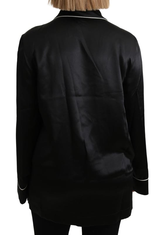 Stunning Dolce & Gabbana silk blouse shirt with logo details
  Color: Black with white detailing
  Full button closure
  Three front pockets
  Made in Italy
  Material: 100% Silk