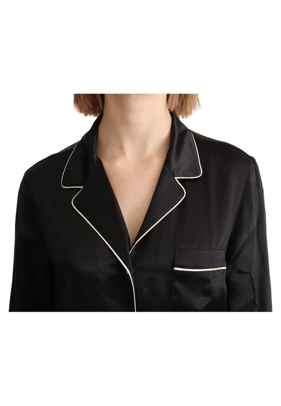 Stunning Dolce & Gabbana silk blouse shirt with logo details
  Color: Black with white detailing
  Full button closure
  Three front pockets
  Made in Italy
  Material: 100% Silk