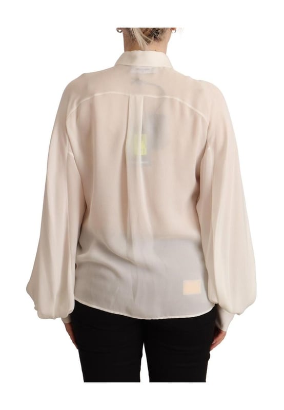 Marca: DSQUARED2.
  Color: Blanco roto.
  Material: 100% seda.
  Mangas largas.
  Blusa con cuello.
  Cierre de boton.
  Sutiles detalles del logotipo.