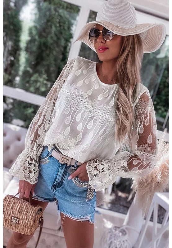 Classic crew neck design
  Delicate embroidered details
  Flounce sleeves for a feminine touch
  Soft and graceful silhouette
  Available in multiple sizes
Material: 100% Polyester