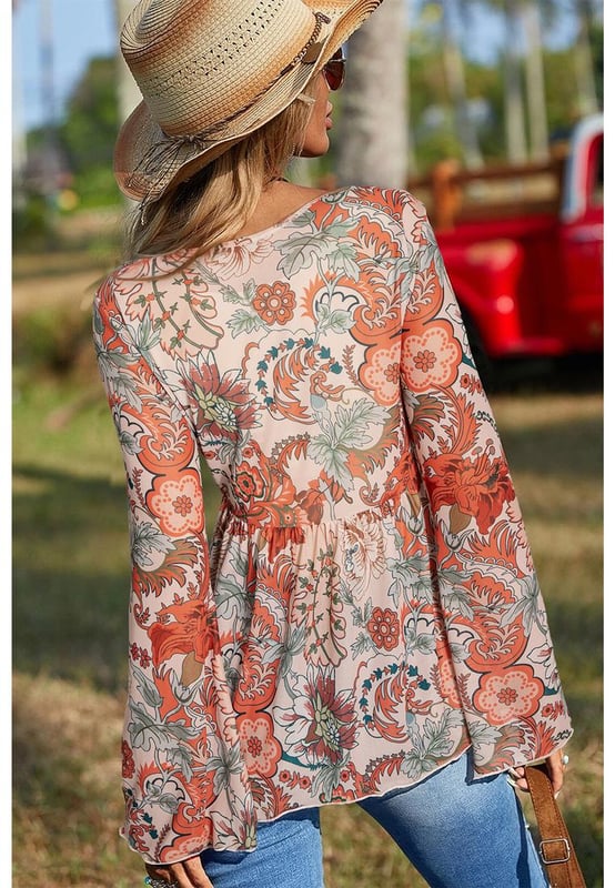 Orange floral print design
  Deep V neck for an elegant neckline
  Front knot detail adds style
  Trendy bell sleeves for a romantic touch
  High elasticity for comfort
  Available in sizes S to XL
Material: 95% Polyester 5% Elastane