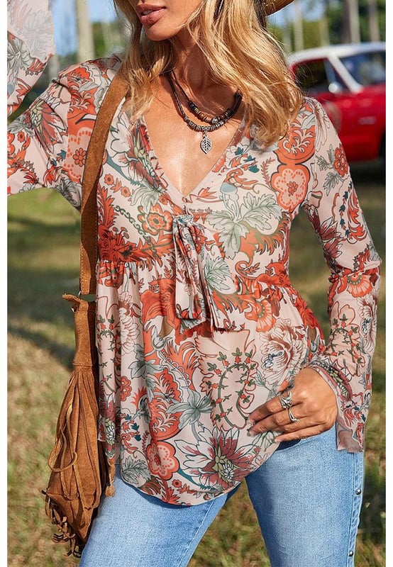 Orange floral print design
  Deep V neck for an elegant neckline
  Front knot detail adds style
  Trendy bell sleeves for a romantic touch
  High elasticity for comfort
  Available in sizes S to XL
Material: 95% Polyester 5% Elastane