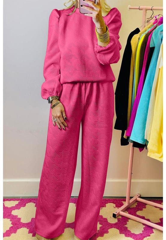 Unique textured design
  Comfortable fit
  Voluminous puff sleeves on the top
  Coordinated style with matching pants
  Ideal for casual wear or lounging
  Available in different sizes
Material: 95% Polyester 5% Elastane