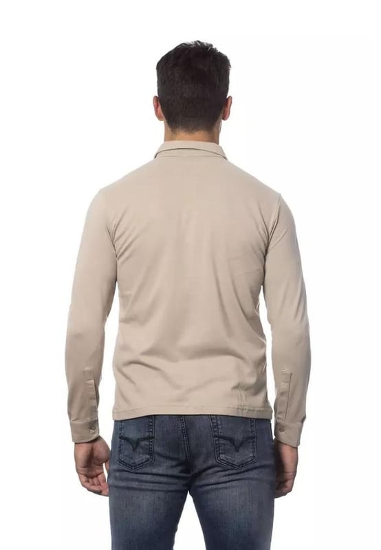 Beige Cotton Shirt
  Regular fit
  Made from Quality cotton
  Comfortable and breathable
  Classic design
  Versatile neutral beige color
  Can be dressed up or down
  Timeless addition to any stylish mans collection
Material: 100% Cotton