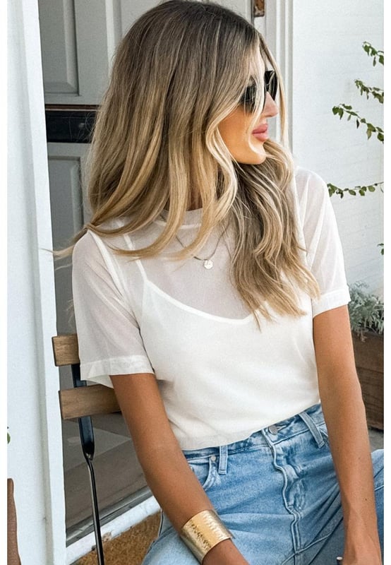Solid white color for versatile styling
  Intricate sheer mesh patchwork detailing
  Classic short sleeves for comfort
  Flattering crew neck design
  High elasticity for a comfortable fit
Material: 95% Polyamide 5% Elastane