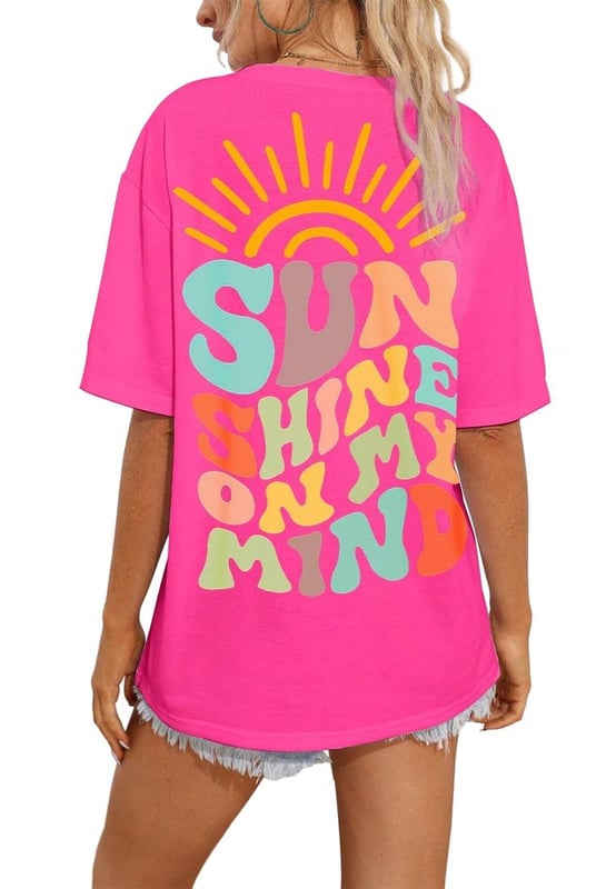 Bright Pink SUNSHINE ON MY MIND Graphic Tee
  Baggy T
  shirt with dropped shoulders and loose cut
  Colorful SUNSHINE ON MY MIND pattern on the back
  Versatile style pairs effortlessly with jeans shorts or a skirt
  Available in all stylish styles
  Size chart available to choose the right size
  Designed for both men and women
Material: 95% Cotton 5% Polyester