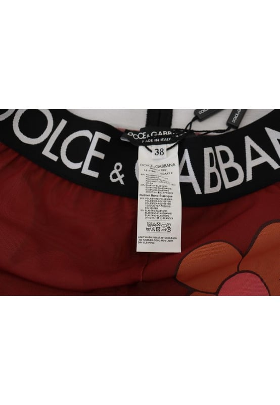 Pantalones leggings florales rojos con cintura elástica  
100% Auténtico Dolce & Gabbana  
Diseño de cintura alta  
Impresión floral multicolor  
Cintura elástica con logo en negro  
Hecho en Italia  
Material: 20% EA 80% PA