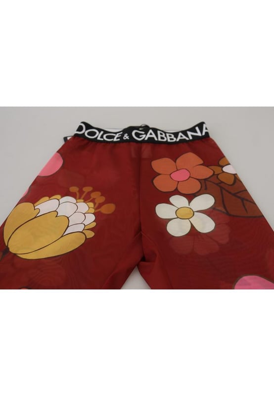 Pantalones leggings florales rojos con cintura elástica  
100% Auténtico Dolce & Gabbana  
Diseño de cintura alta  
Impresión floral multicolor  
Cintura elástica con logo en negro  
Hecho en Italia  
Material: 20% EA 80% PA