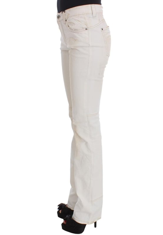 CoSTUME NATIONAL CNC Jeans
  Slim Fit
  Color: White
  Material: 97% Cotton 3% Other Fibers
  Fly: Zipper and button
  Logo details