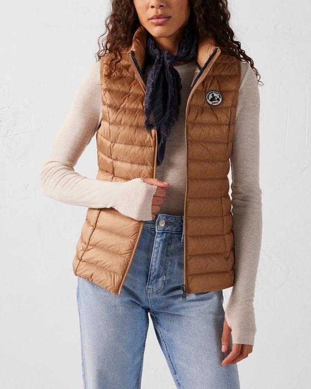 Stay warm with the sleek and stylish Seda Down Gilet. Designed for those who seek comfort and elegance in any casual setting.