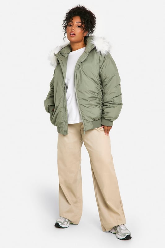 Add the finishing touch to your outfit with this outerwear piece from our women's plus size coats range. A wardrobe staple that's perfect for layering, this style provides added warmth and adds an extra something to your fit. Made with added fabric for the perfect fit, this piece is a whole vibe - just throw on over your fave outfit and you're sorted. Whether you choose a plus size denim jacket or keep things cosy in winter with a plus size teddy coat we've got the hottest coats for curvy girls that are always on-trend. Style: Bomber JacketDesign: PlainFabric: WovenLength: RegularNeckline: HoodedSleeve Length: Long Sleeve