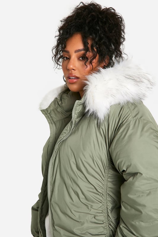 Add the finishing touch to your outfit with this outerwear piece from our women's plus size coats range. A wardrobe staple that's perfect for layering, this style provides added warmth and adds an extra something to your fit. Made with added fabric for the perfect fit, this piece is a whole vibe - just throw on over your fave outfit and you're sorted. Whether you choose a plus size denim jacket or keep things cosy in winter with a plus size teddy coat we've got the hottest coats for curvy girls that are always on-trend. Style: Bomber JacketDesign: PlainFabric: WovenLength: RegularNeckline: HoodedSleeve Length: Long Sleeve