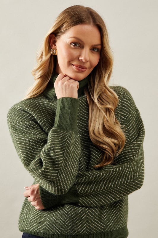 Striking chevron stitch pattern adds visual interest
        Cosy roll neck design for extra warmth
        Relaxed fit with dropped shoulders for comfort
        Ribbed cuffs and hem for a snug finish
        Versatile knit suitable for various occasions
    
    Embrace sophistication and comfort with this exquisite Chevron Stitch Roll Neck Jumper from Wallis. The eye-catching chevron pattern radiates elegance, while the roll neck design offers both style and warmth. Perfect for those chilly autumn days or cosy winter evenings, this jumper effortlessly transitions from day to night. Pair it with dark wash jeans and ankle boots for a casual yet polished look, ideal for family gatherings or weekend brunches. For a more refined ensemble, team it with tailored trousers and heeled loafers, making it suitable for informal work settings or dinner dates. The relaxed fit ensures ease of movement, while the textured knit adds a touch of luxury to your wardrobe. This versatile piece is a must-have for the fashion-conscious woman who values both style and comfort in her everyday attire.