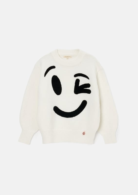 WARNING - Grown-ups will be jealous of your wardrobe! Our new cute and cosy monochrome jumper is designed with a fun wink face pattern that is sure to bring smiles all round.