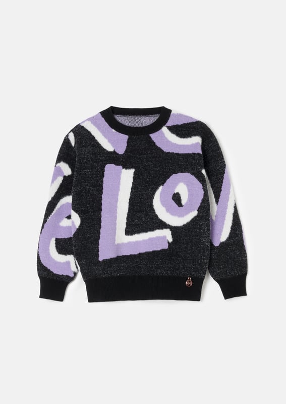Love is our new fluffy slogan knit! Crafted from the softest monochrome yarn. highlighted with lilac and cut into a relaxed silhouette. Style with anything for wearable optimism!.