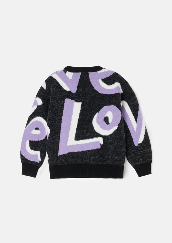 Love is our new fluffy slogan knit! Crafted from the softest monochrome yarn. highlighted with lilac and cut into a relaxed silhouette. Style with anything for wearable optimism!.