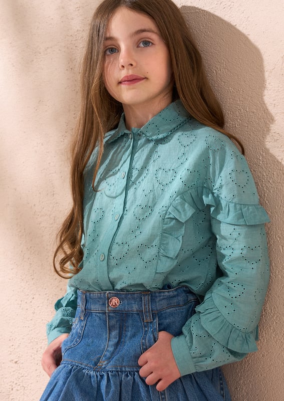 Crafted from intricate broderie anglaise in soft sea   with pretty ruffled sleeves. this blouse is the perfect blend of smart casual dressing.