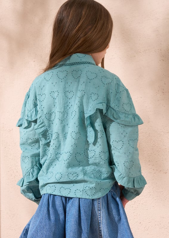 Crafted from intricate broderie anglaise in soft sea   with pretty ruffled sleeves. this blouse is the perfect blend of smart casual dressing.