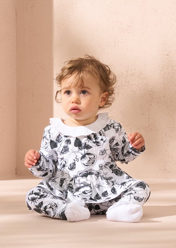 Yeah baby! They'll be the smartest baby in the park in our new printed two-sie with matching hat. Crafted from super soft cotton jersey with a crisp   collar and an adorable floral print.