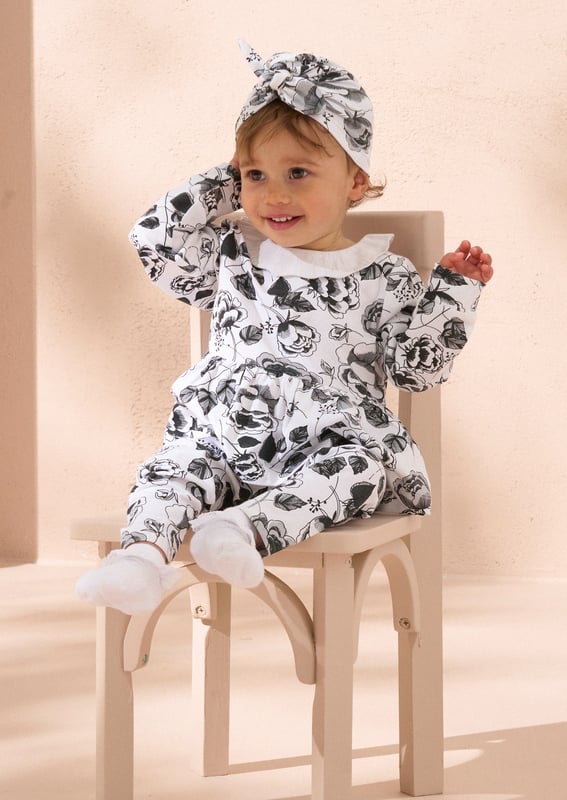 Yeah baby! They'll be the smartest baby in the park in our new printed two-sie with matching hat. Crafted from super soft cotton jersey with a crisp   collar and an adorable floral print.