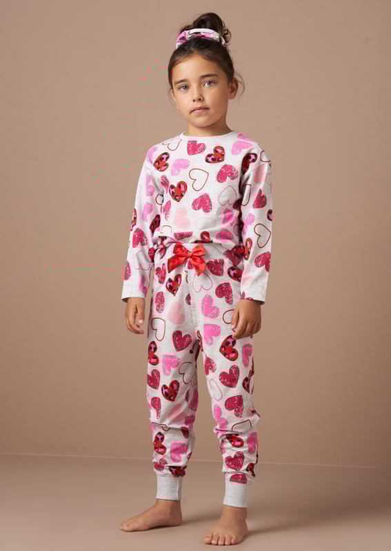 Perfect for your little dreamer. These super cute leopard heart print PJs in classic   marl are made in the softest jersey and come with a matching hair scrunchie. Ideal for gifting. We heart them!.