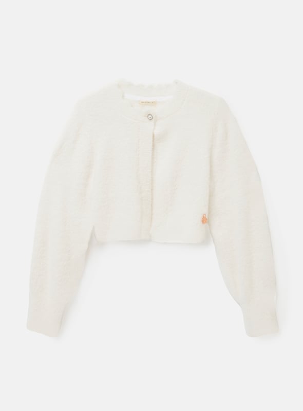 The perfect cover up. A super soft fluffy knit in classic off   finished with the prettiest diamante buttons.Snuggly and stylish in equal measure.. About Me: 100% Nylon. Look After Me: Think Planet. Wash At 30C.