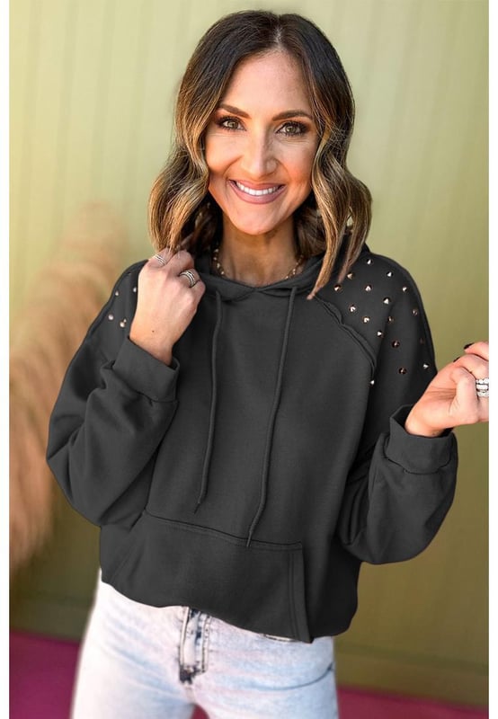 Black solid color hoodie with rivet stud detailing
  Raglan sleeves and convenient hood for added warmth
  Features practical kangaroo pocket for storing essentials
  Available in a range of sizes
  Medium elasticity ensures a comfortable fit for all body types
Material: 50% Polyester 50% Cotton