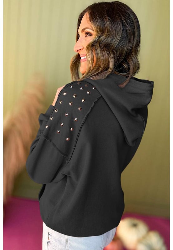 Black solid color hoodie with rivet stud detailing
  Raglan sleeves and convenient hood for added warmth
  Features practical kangaroo pocket for storing essentials
  Available in a range of sizes
  Medium elasticity ensures a comfortable fit for all body types
Material: 50% Polyester 50% Cotton