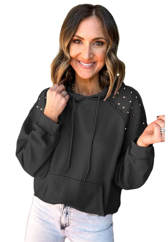 Black solid color hoodie with rivet stud detailing
  Raglan sleeves and convenient hood for added warmth
  Features practical kangaroo pocket for storing essentials
  Available in a range of sizes
  Medium elasticity ensures a comfortable fit for all body types
Material: 50% Polyester 50% Cotton