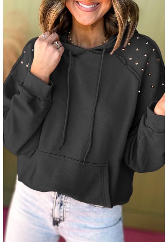 Black solid color hoodie with rivet stud detailing
  Raglan sleeves and convenient hood for added warmth
  Features practical kangaroo pocket for storing essentials
  Available in a range of sizes
  Medium elasticity ensures a comfortable fit for all body types
Material: 50% Polyester 50% Cotton