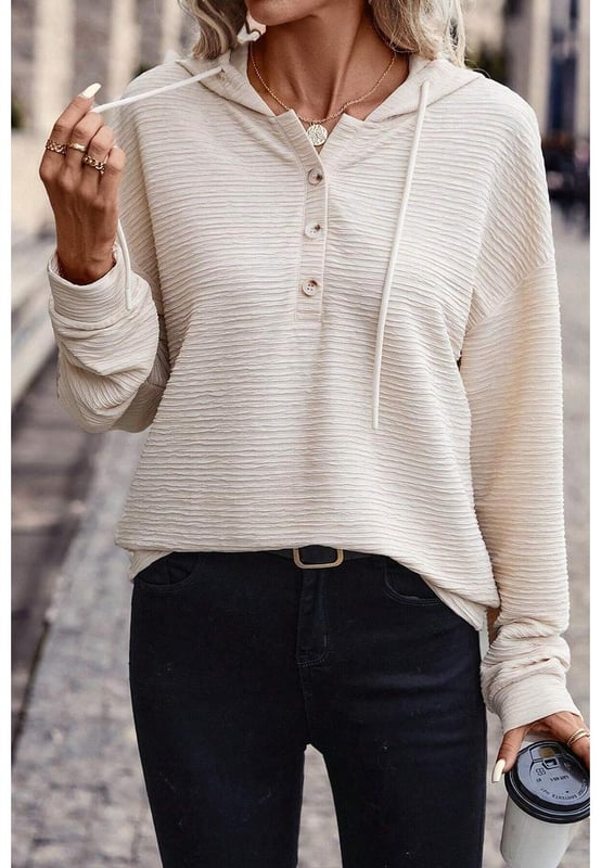 Soft and lightweight
  Trendy color with delicate textures
  Drawstring hood and buttoned split neckline
  Made of high
  quality fabric with high stretch
  Available in various sizes
Material: 95% Polyester 5% Elastane