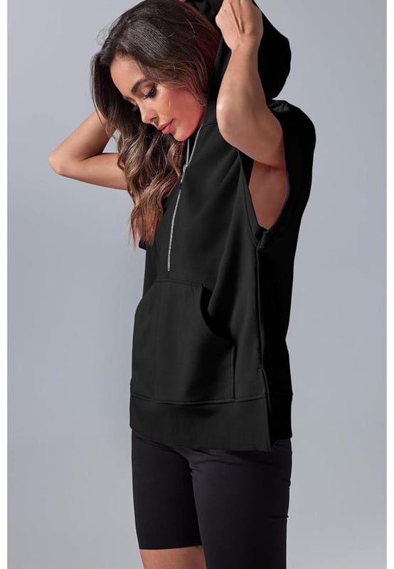 Black half zipper hoodie with kangaroo pocket
  Short sleeves for a casual and comfortable feel
  Stylish hood provides extra coverage
  Versatile and easy
  to
  match wardrobe essential
  Modern twist on classic hoodie design
  Available in various sizes
Material: 65% Polyester 35% Cotton
