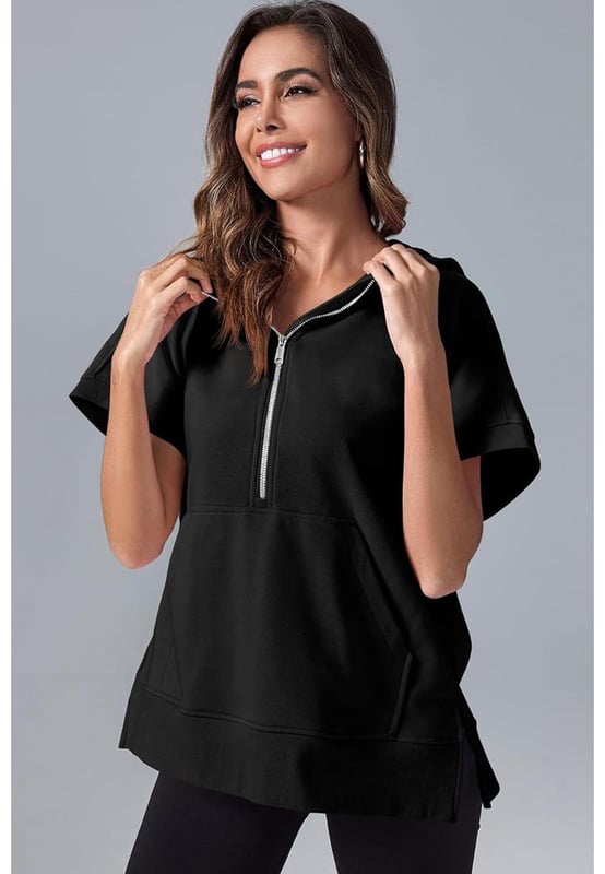 Black half zipper hoodie with kangaroo pocket
  Short sleeves for a casual and comfortable feel
  Stylish hood provides extra coverage
  Versatile and easy
  to
  match wardrobe essential
  Modern twist on classic hoodie design
  Available in various sizes
Material: 65% Polyester 35% Cotton
