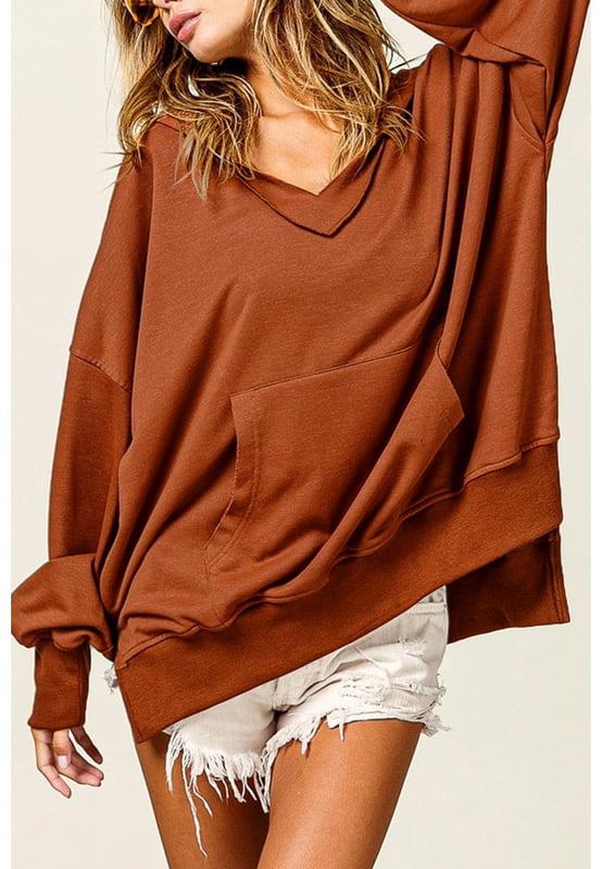 Chestnut V Neck Kangaroo Pocket Oversized Hoodie
  Perfect for lounging at home or running errands in comfort
  V
  neck design adds a modern twist to this classic hoodie
  Kangaroo pocket provides a convenient and practical touch
  Relaxed fit for a versatile and comfortable option for everyday wear
  Made with fine fabric
  Perfect for layering over your favorite tops for a relaxed and casual look
  Available in multiple sizes (check size chart for perfect fit)
Material: 65% Polyester 30% Cotton 5% Elastane
