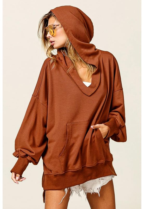 Chestnut V Neck Kangaroo Pocket Oversized Hoodie
  Perfect for lounging at home or running errands in comfort
  V
  neck design adds a modern twist to this classic hoodie
  Kangaroo pocket provides a convenient and practical touch
  Relaxed fit for a versatile and comfortable option for everyday wear
  Made with fine fabric
  Perfect for layering over your favorite tops for a relaxed and casual look
  Available in multiple sizes (check size chart for perfect fit)
Material: 65% Polyester 30% Cotton 5% Elastane