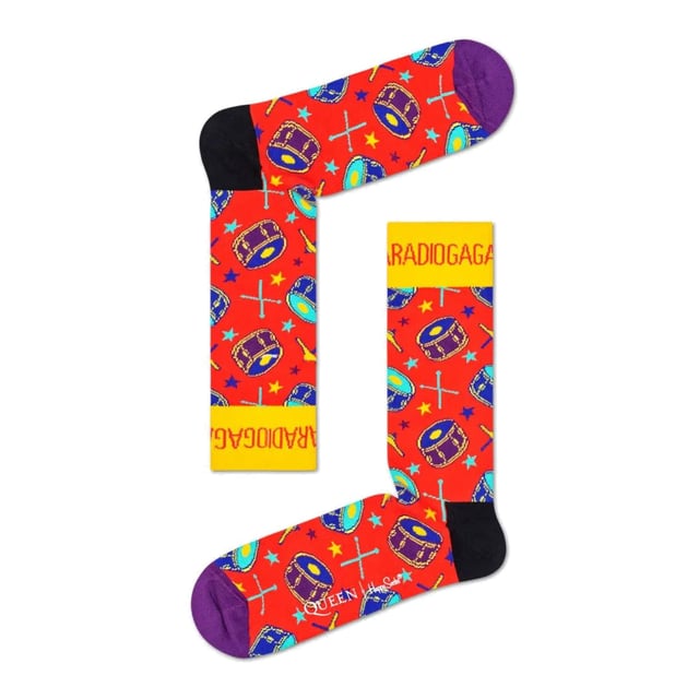Happy Socks Queen Socks: Happy Socks are a popular brand providing a high-quality sock that combines unique designs and craftsmanship. Mikael Söderlindh and Viktor Tell had a vision to spread happiness by turning an everyday essential into a colorful design piece. In 2008, socks were just socks. White, grey and black pieces of textile that were nowhere close to the fashionable and creative design piece they could become. The world’s most comfortable and colorful tool for spreading happiness was born. This concept is now brought to life by Happy Socks’ talented team of creatives. Today, Happy Socks has reached 90 countries and every continent. With Concept Stores all around the world, from LA to Tokyo, Happy Socks can be found in over 10,000 top fashion apparel boutiques. These socks are made from a soft, high quality combed cotton rich blend and in a fine gauge knit for versatile wear. Finished with a comfortable smooth toe seam, these socks feature standard cuffs, and are officially licensed limited edition socks. They come in a pack of 1 pair. They are machine washable at 40. They are made from 86% Cotton 12% Polyamide 2% Elastane. Extra Product Details: - Queen Socks by Happy Socks - Bohemian Rhapsody - We Will Rock You - Radio Ga Ga Socks - Colour Block Design - Unique and Funky Patterns - 1 Pair Pack - Machine washable at 40 - 86% Cotton 12% Polyamide 2% Elastane.