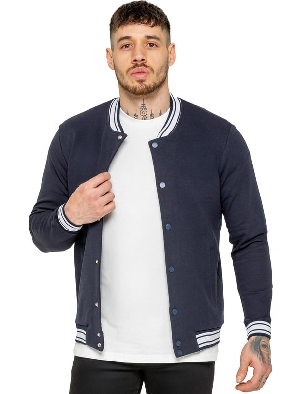 The Enzo Milano Men's Bomber Jacket combines classic style with modern comfort. Designed in a regular fit, it features a stretch fabric for ease of movement and all-day comfort. The contrast-tipped ribbed collar and cuffs add a stylish touch, while the popper fastening ensures easy wear. With two practical pockets and ribbed trims for a snug fit, this versatile jacket is perfect for any casual or smart-casual look.(35)
