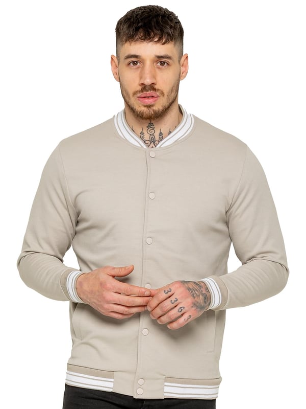 The Enzo Milano Men's Bomber Jacket combines classic style with modern comfort. Designed in a regular fit, it features a stretch fabric for ease of movement and all-day comfort. The contrast-tipped ribbed collar and cuffs add a stylish touch, while the popper fastening ensures easy wear. With two practical pockets and ribbed trims for a snug fit, this versatile jacket is perfect for any casual or smart-casual look.(35)