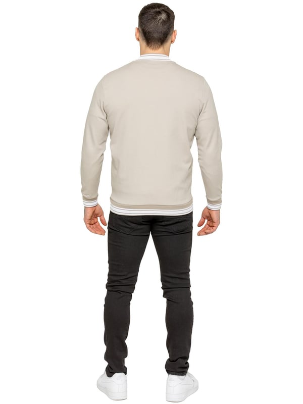 The Enzo Milano Men's Bomber Jacket combines classic style with modern comfort. Designed in a regular fit, it features a stretch fabric for ease of movement and all-day comfort. The contrast-tipped ribbed collar and cuffs add a stylish touch, while the popper fastening ensures easy wear. With two practical pockets and ribbed trims for a snug fit, this versatile jacket is perfect for any casual or smart-casual look.(35)
