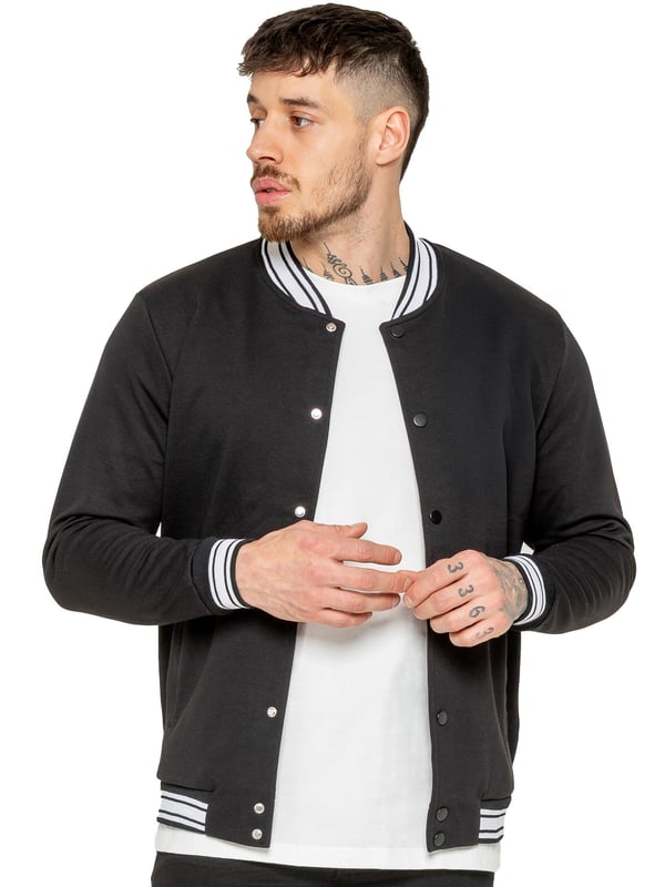 The Enzo Milano Men's Bomber Jacket combines classic style with modern comfort. Designed in a regular fit, it features a stretch fabric for ease of movement and all-day comfort. The contrast-tipped ribbed collar and cuffs add a stylish touch, while the popper fastening ensures easy wear. With two practical pockets and ribbed trims for a snug fit, this versatile jacket is perfect for any casual or smart-casual look.(35)