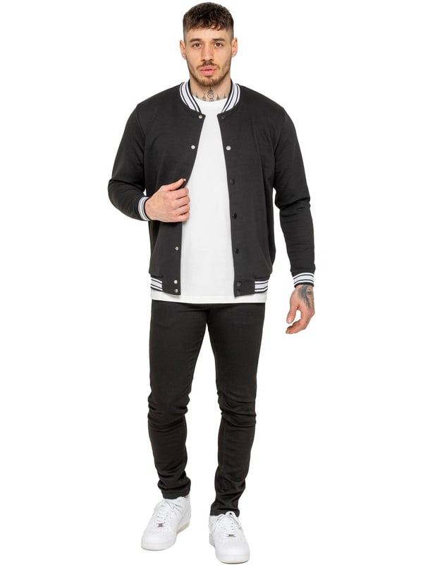 The Enzo Milano Men's Bomber Jacket combines classic style with modern comfort. Designed in a regular fit, it features a stretch fabric for ease of movement and all-day comfort. The contrast-tipped ribbed collar and cuffs add a stylish touch, while the popper fastening ensures easy wear. With two practical pockets and ribbed trims for a snug fit, this versatile jacket is perfect for any casual or smart-casual look.(35)