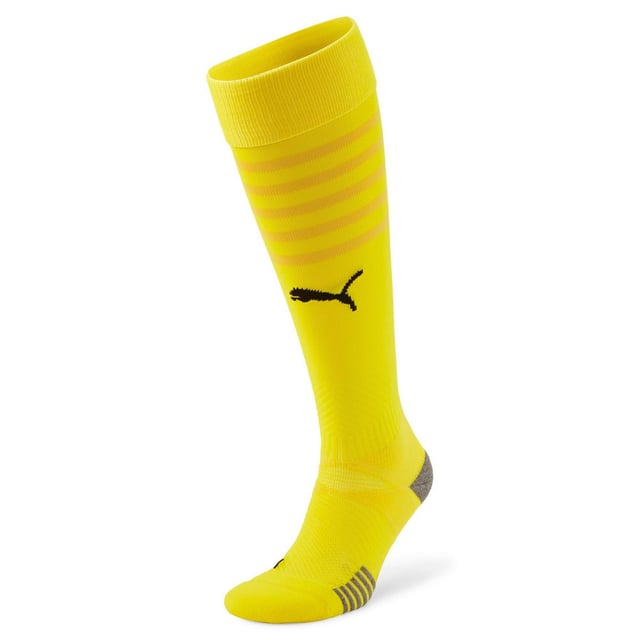 The Puma TeamFinal Football Socks are designed to provide comfort, support, and durability during intense football matches or training sessions. Crafted with performance in mind, these socks ensure that your feet stay comfortable and well-supported while you focus on your game.
Key Features:
Comfortable &amp; Breathable Fabric: 

Made from a soft, breathable blend of materials, these socks are designed to keep your feet dry and comfortable throughout your game, helping to regulate moisture and prevent overheating.


Arch Support: 

Equipped with arch support, these socks provide added stability, ensuring a snug and supportive fit around the midfoot area, reducing foot fatigue during intense movements.


Compression Fit: 

The socks feature a compression fit around the ankle and calf, which improves blood circulation and reduces the risk of injury, making them ideal for both professional and amateur players.


Padded Cushioning: 

The padded cushioning around the heel and toe areas provides extra comfort and protection, reducing pressure and impact during sudden movements or tackles.


Durable Design: 

Crafted with reinforced stitching in key areas, these socks are built to withstand the wear and tear of regular football sessions, offering long-lasting durability.


Puma Branding: 

The iconic Puma logo is prominently displayed, showcasing your connection to a trusted brand known for high-quality athletic gear.


Versatile Use: 

These socks are perfect for training, match day, or casual wear, providing a comfortable fit that complements any football kit.


The Puma TeamFinal Football Socks are a must-have for any serious football player, offering the perfect combination of comfort, durability, and performance. Whether you're training, playing, or recovering, these socks will help keep your feet feeling fresh and supported throughout the game.
