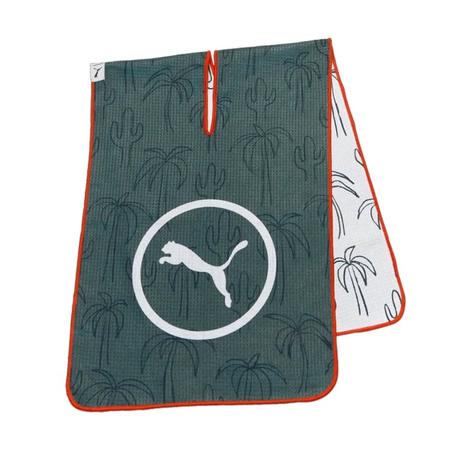 "The Puma Golf Cactus Palm Towel is the perfect accessory for golfers who want to combine functionality with style. Featuring a vibrant and unique cactus palm design, this towel adds a pop of personality to your golf bag while keeping your clubs clean and dry throughout your game. Made from high-quality materials, it's a practical and stylish tool to help maintain your equipment and elevate your golfing experience.
Key Features:
Premium Quality Material: 

Made from soft, absorbent cotton, the towel is designed to quickly dry off your clubs, hands, or golf balls, helping you maintain performance and cleanliness throughout the game.


Stylish Cactus Palm Design: 

Featuring a fun and eye-catching cactus palm print, this towel adds a playful yet stylish element to your golf accessories, ensuring it stands out in your golf bag.


Compact &amp; Convenient: 

The compact design allows for easy storage in your bag while being large enough to handle various cleaning tasks during your round.


Durable &amp; Long-Lasting: 

Made with high-quality materials, this towel is built to withstand frequent use and maintain its look and absorbency over time.


Easy Attachment: 

Equipped with a carabiner clip, the towel can be easily attached to your golf bag, ensuring itâ€™s always within reach when you need it.


Versatile Use: 

Perfect for wiping down clubs, balls, or even hands during your game, the towel is an essential accessory for golfers of all skill levels.


The Puma Golf Cactus Palm Towel is the perfect combination of practicality and style, helping you stay clean, dry, and ready for your best round of golf. Its unique design and high-quality construction make it a standout accessory for your golf set.