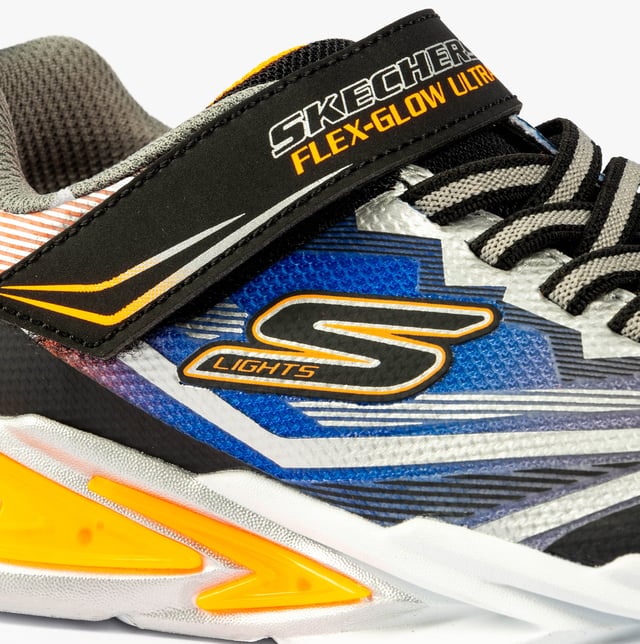 Skechers Skechers 400139L/BKSL FLEX-GLOW ULTRA Boys Trainers Black Silver Upper Material: SyntheticLining Material: TextileSole Material: RubberClosure/Fastening: Lace-UpFeatures: Comfort,Light UpToe Shape: RoundShoe Width: RelaxedItem Weight: 0.45 KGHeel Height: Low (2.5-4.9cm)Shoe Shaft Height: Low TopTrainer Style: CasualGift Boxed: NoProduct Code: 400139L/BKSL