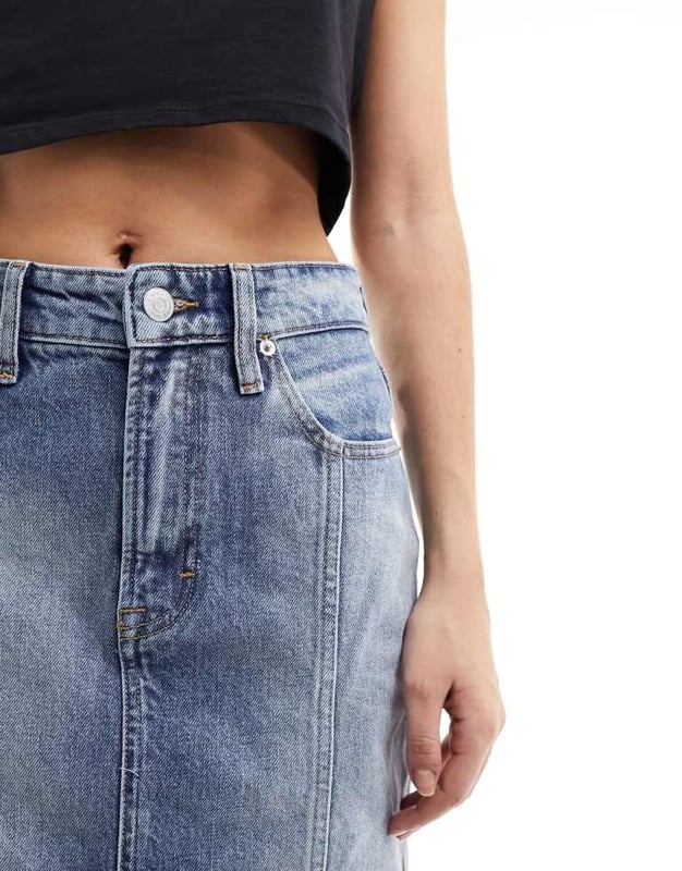 Skirts by Tommy Jeans Lower-half looks High rise Belt loops Five pockets Branded patch to reverse Regular fitSold By: Asos
