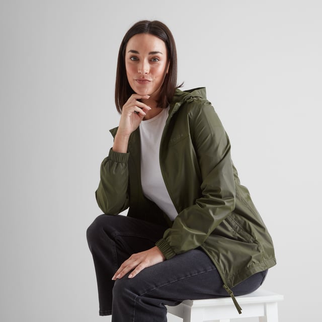 With waterproof fabric, fully taped seams and a water-repellent coating for good measure, this packaway jacket will definitely keep you dry. Inside is fully lined with a soft mesh on the body and smooth taffeta in the sleeves so your arms slide in easily. It's breathable so you don't get clammy and it keeps out the most blustery Yorkshire wind. The hood and hem can be tightened to keep out draughts and when you're back indoors the whole thing packs down into its own little matching mesh bag.  A shaped cut looks flattering on and it's finished with our 'Truth Over Glory' branding on the chest.