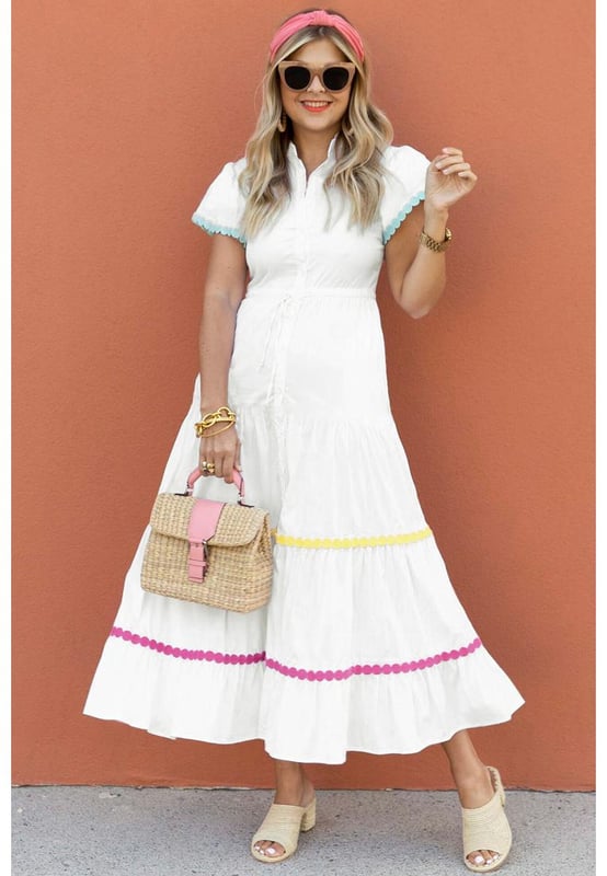 Our styles are designed with a trendy fitted look in mind following an international size standard. For the best fit we suggest choosing one size up from your usual. Be sure to check our sizing chart to find your perfect match!
  White Colorblock Rickrack Trim Short Sleeve Drawstring Waist Long Dress
  Vibrant ensemble with bold colors and cute details
  Rickrack trim for added visual appeal with vintage flair
  Short sleeves and slit neck for a stylish touch
  Drawstring waist for a customizable fit
  Perfect for those who love to stand out in style
Material: 100% Cotton
Size on Tag: S