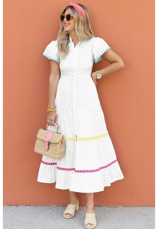 Our styles are designed with a trendy fitted look in mind following an international size standard. For the best fit we suggest choosing one size up from your usual. Be sure to check our sizing chart to find your perfect match!
  White Colorblock Rickrack Trim Short Sleeve Drawstring Waist Long Dress
  Vibrant ensemble with bold colors and cute details
  Rickrack trim for added visual appeal with vintage flair
  Short sleeves and slit neck for a stylish touch
  Drawstring waist for a customizable fit
  Perfect for those who love to stand out in style
Material: 100% Cotton
Size on Tag: S